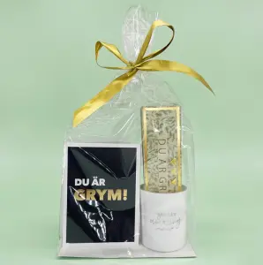 Presentset Du &auml;r Grym i cellofan