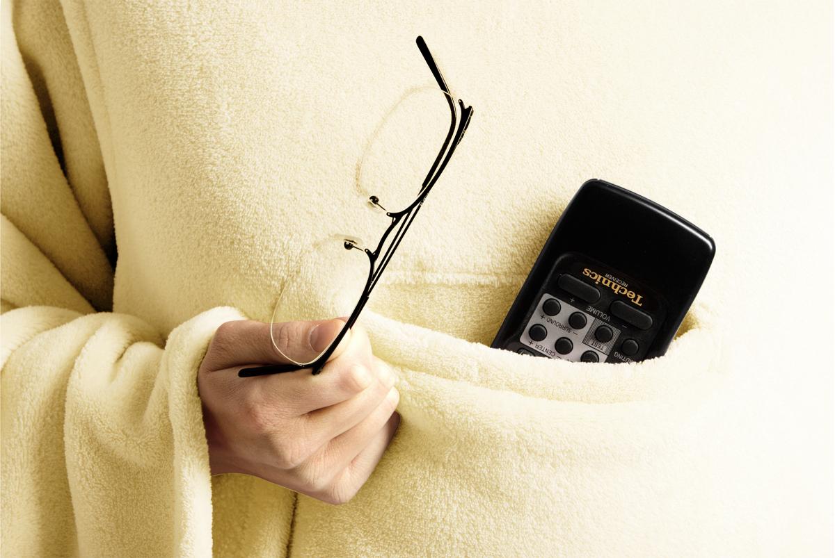 Snug Rug Deluxe är en mysig och praktisk filt med ärmar