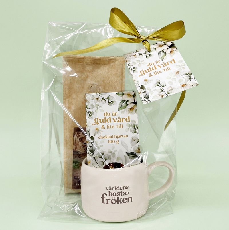 Presentset Fröken Guld Värd i cellofan