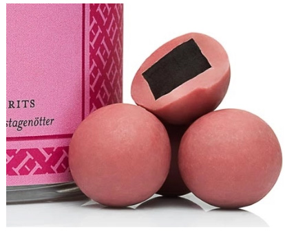 Haupt Lakrits - Ruby, salt lakrits doppad i rosa choklad och pistagenötter.