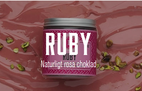 Haupt Lakrits - Ruby, salt lakrits doppad i rosa choklad och pistagentter.