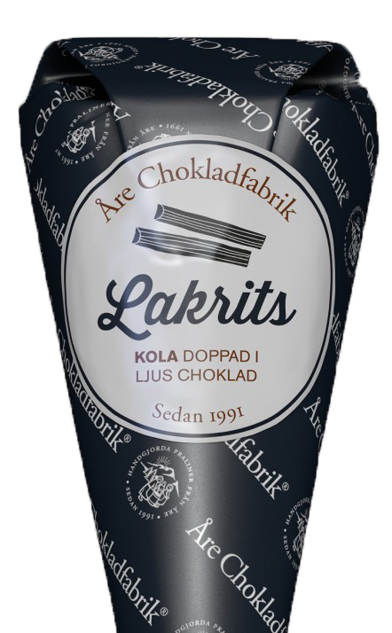Lakritschokladkola doppad i ljus choklad, chokladpraliner från Åre Chokladfabrik