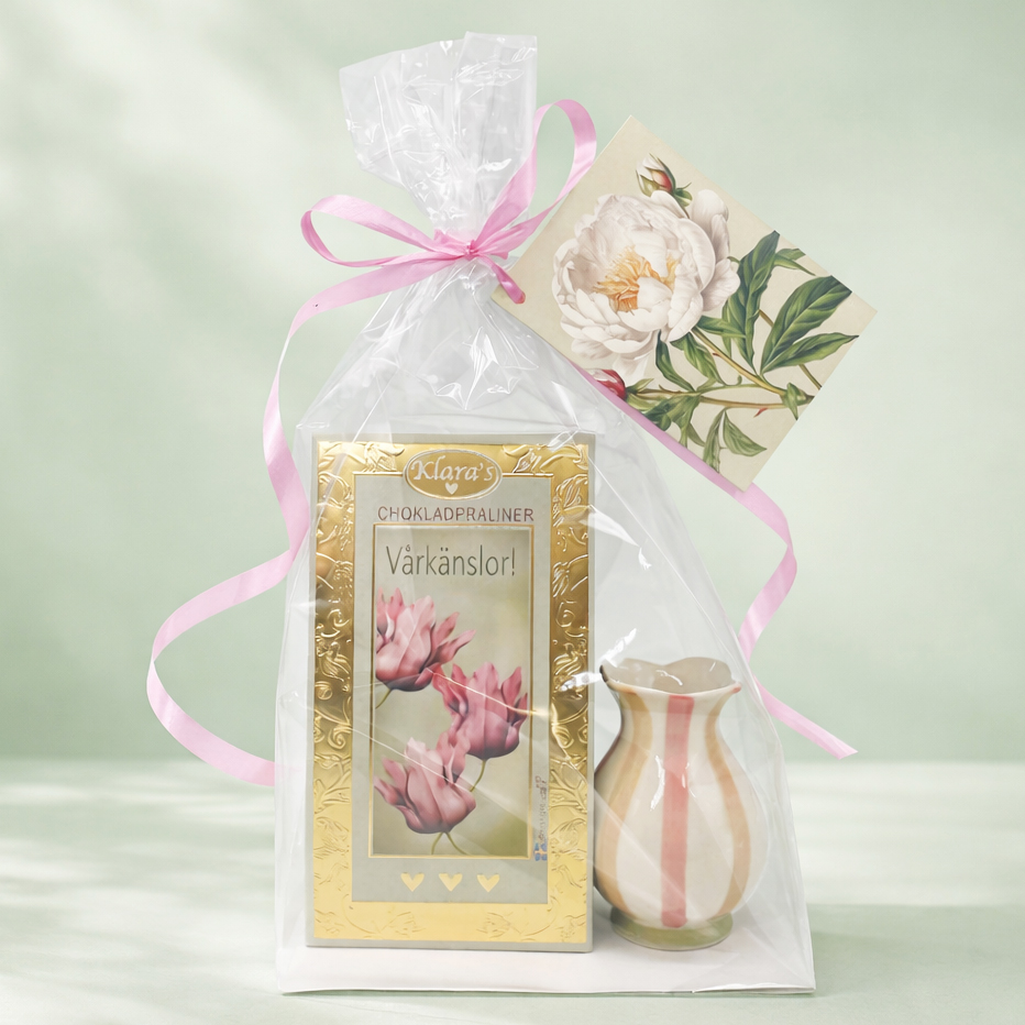 Presentset Vårkänsla i cellofan (Chokladpraliner & ljuslykta)