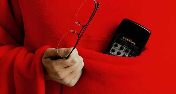 Snug Rug Deluxe är en mysig och praktisk filt med ärmar